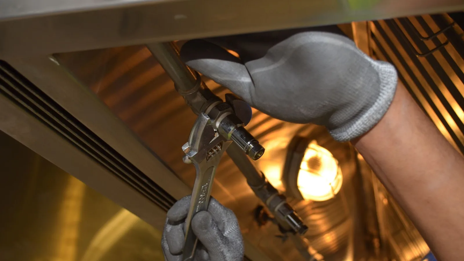 Technician diagnosing a residential boiler