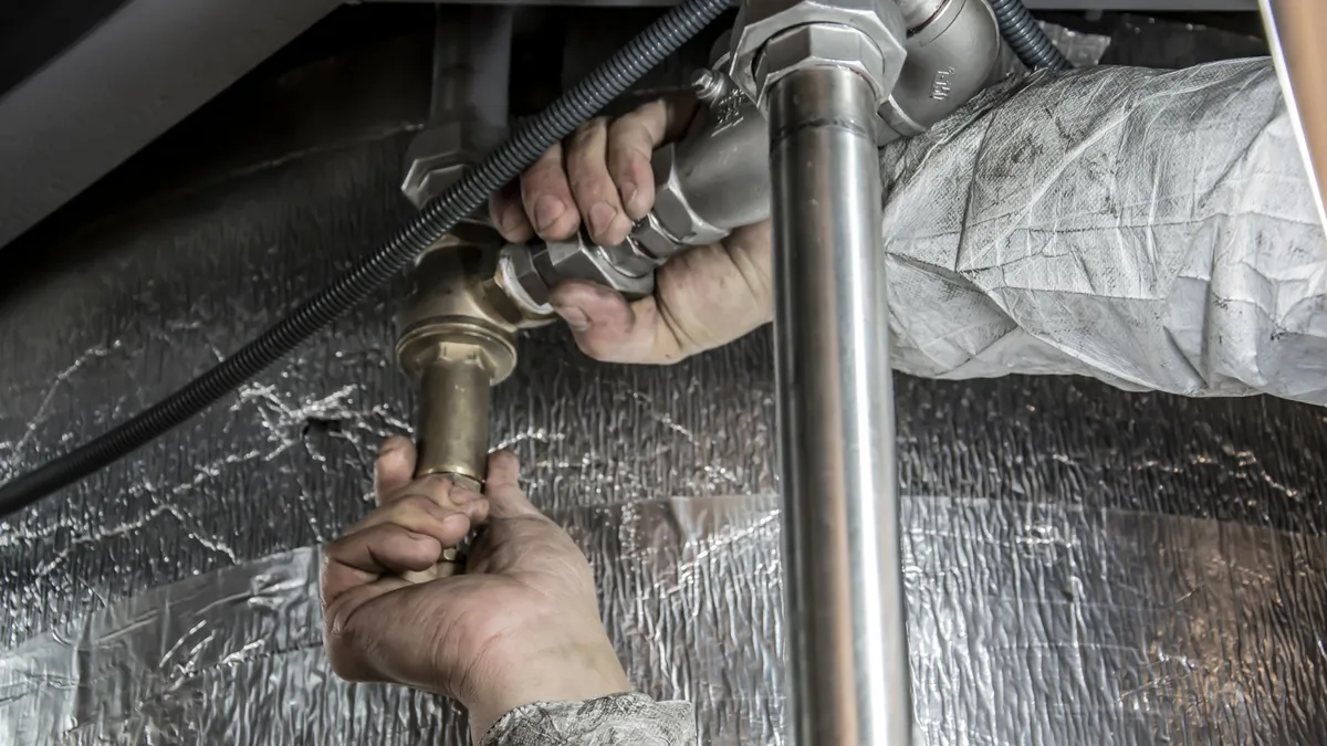 Residential plumbing repair in progress